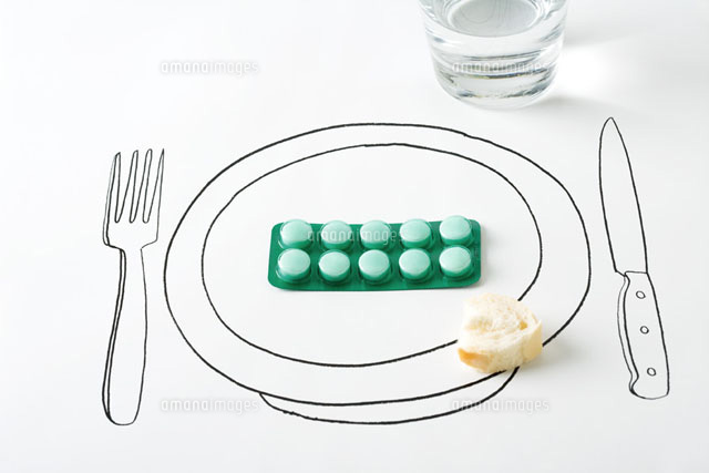 Blister pack of pills and small piece of bread on plate
(c)Laurence Mouton/PhotoAlto