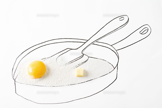 Egg yolk and butter in drawing of frying pan
(c)Laurence Mouton/PhotoAlto