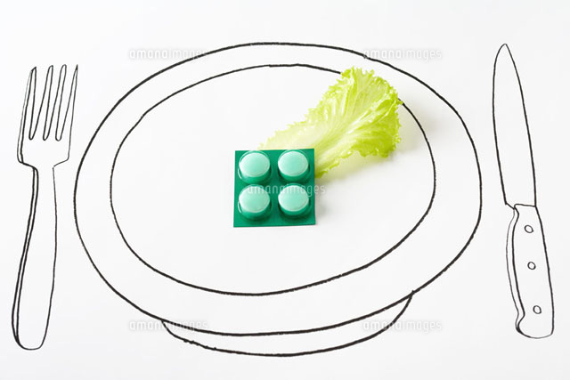 Blister pack of pills and single piece of lettuce on plate
(c)Laurence Mouton/PhotoAlto