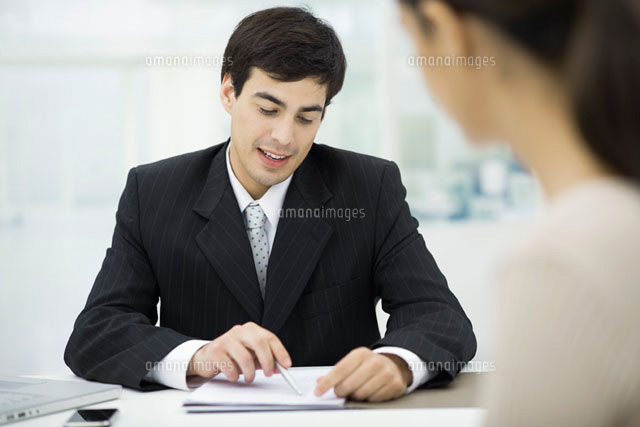 Businessman explaining document to client
(c)Eric Audras/PhotoAlto