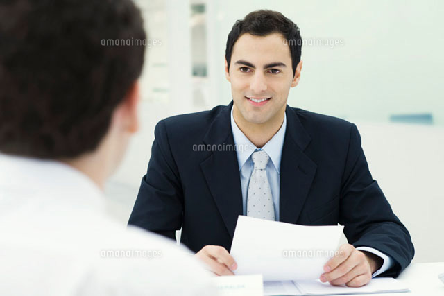 Businessman holding document,smiling at client
(c)Eric Audras/PhotoAlto
