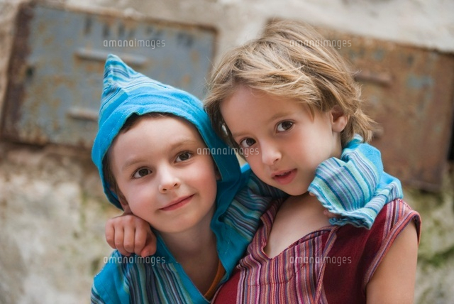 Young Siblings With Arms Around Each Others Shoulders Port 