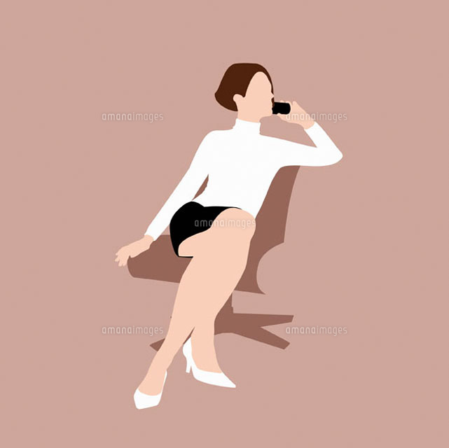 Woman sitting on chair & using telephone
(c)Ralf Hiemisch/fStop
