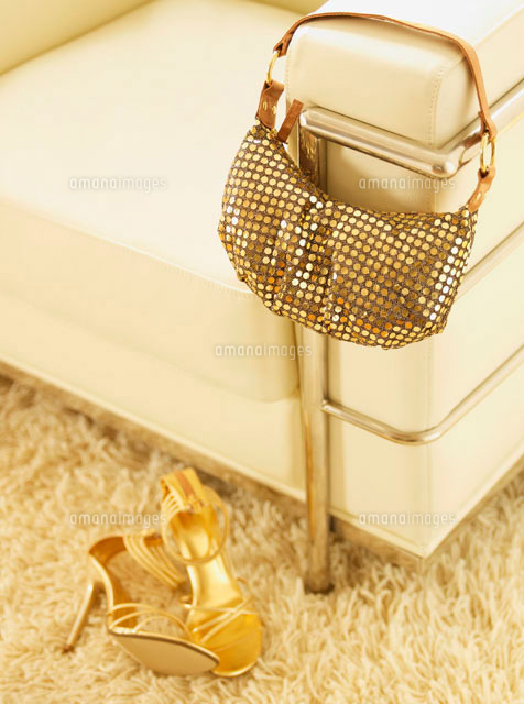 gold heels and bag