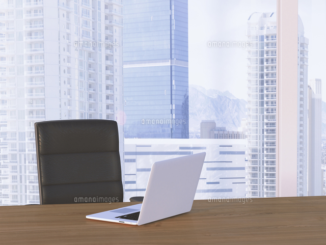 Digital Illustration of Desk with Arm Chair and Laptop in front of Skyline
(c)Radius Images