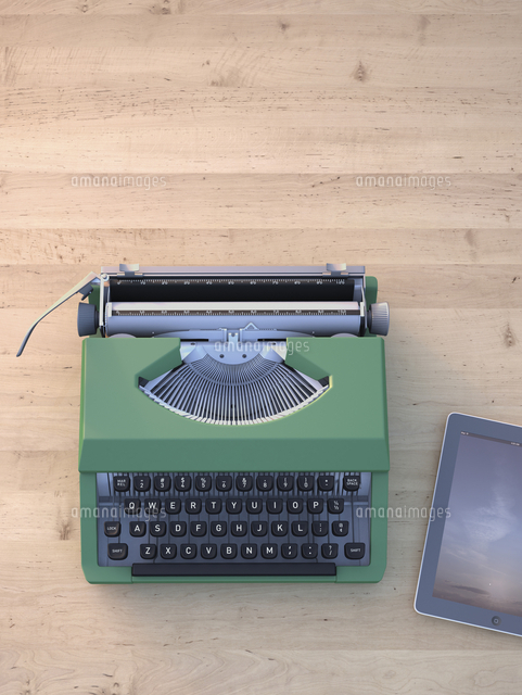 Digital Illustration of Old Typewriter and Modern Tablet Computer on Wooden Desk
(c)Radius Images