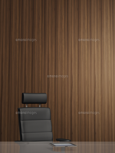 Illustration of office arm chair in front of wooden wall, tablet computer on glass table, studio sho
(c)Radius Images
