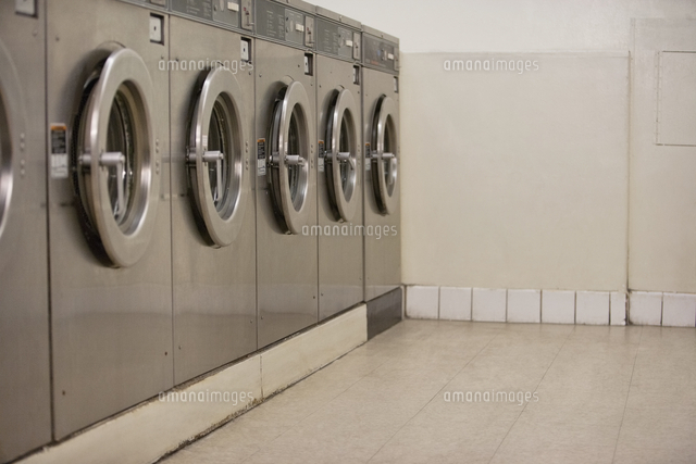 Row of self-service clothes dryers in Laundromat
(c)moodboard