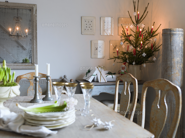 sweden elegant dining table and christmas tree in living room